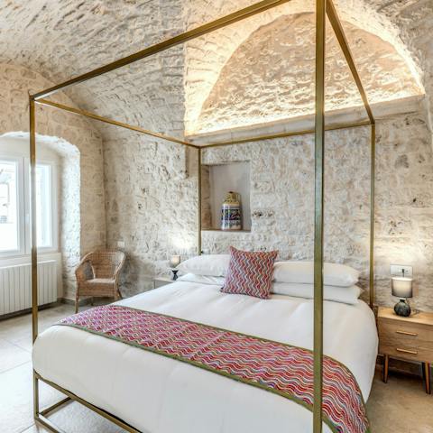 Drift off to sleep beneath the vaulted stone ceilings