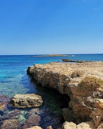 Explore the stunning Playa Ognina