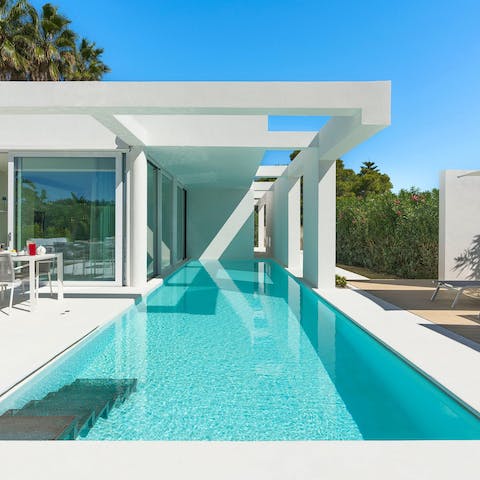 Dry off on a lounger after floating about in the private pool